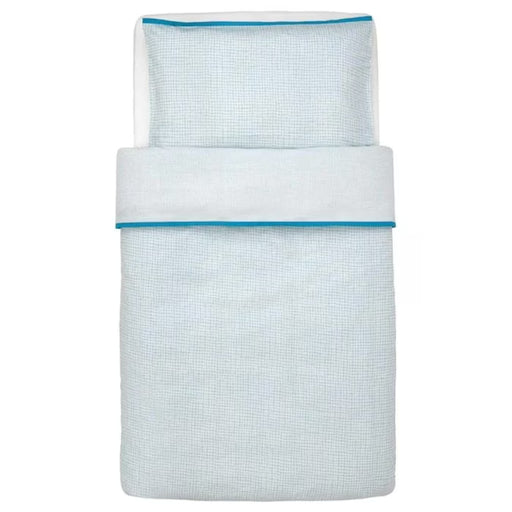 IKEA KLÄMMIG turquoise quilt cover and pillowcase for cot folded flat front view #20372985