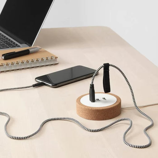 IKEA NORDMÄRKE USB charger white cork angled side view showing cork base and housing depth