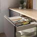 IKEA UPPDATERA spice rack in a kitchen drawer filled with various spice jars