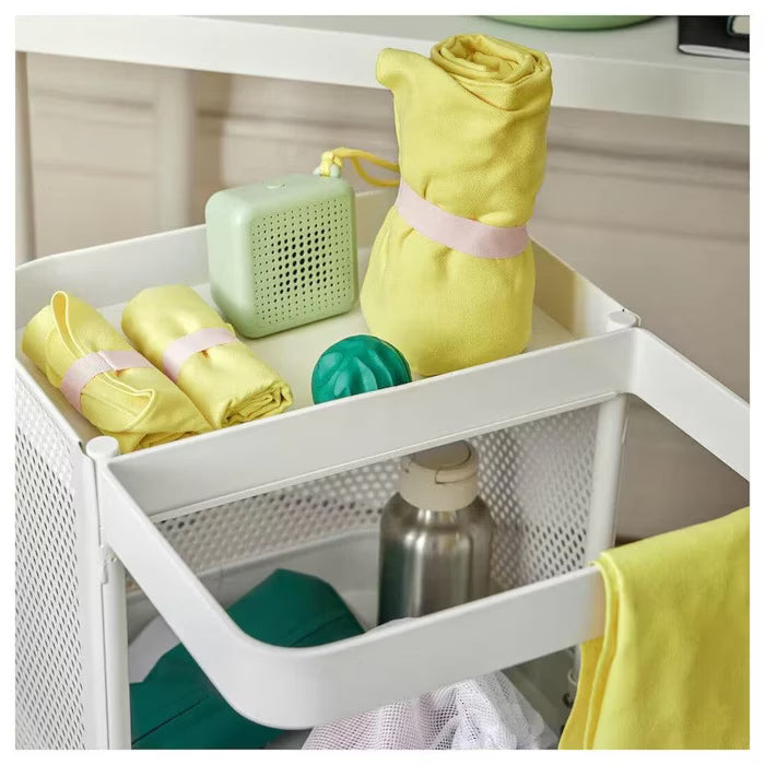 IKEA DAJLIEN yellow bath towel rolled up with band and draped over towel rack