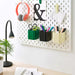 IKEA SKADIS container mixed colors neatly organizing supplies on a Pegboard