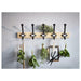 IKEA KARTOTEK hook rack in kitchen with five labelled hooks holding herb bundles and utensils