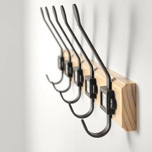 IKEA KARTOTEK pine grey hook rack in hallway holding jackets and bags near front door