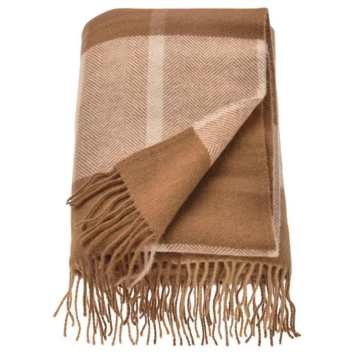 IKEA MYRULL light brown wool throw 130x170 cm folded on sofa showing check pattern #20563485