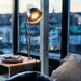 IKEA RÅVAROR stainless steel clamp lamp clamped to table edge side view showing full height