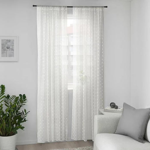 IKEA KRONMAL white sheer curtain close-up showing dot pattern texture and fabric detail