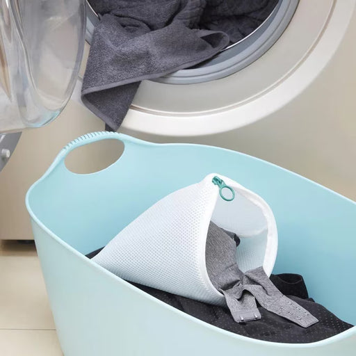 IKEA SLIBB washing bag white mesh detail showing zipper and piping construction