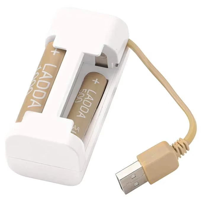  IKEA VINNINGE white battery charger with detachable USB-A cable shown connected to laptop