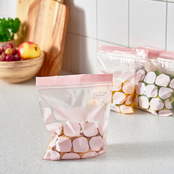 IKEA ISTAD light pink polka dot bag holding marshmallows with clear zip visible