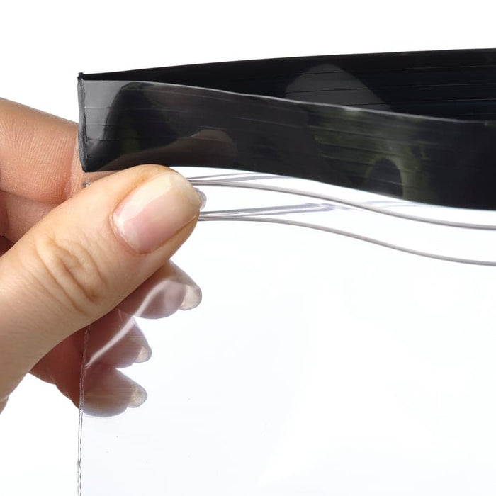  Hand demonstrating the double-seal resealable closure on a transparent IKEA ISTAD zip bag