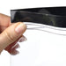 Hand demonstrating the double-seal resealable closure on a transparent IKEA ISTAD zip bag