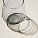  Top-down view of IKEA IVRIG clear glass showing smooth curved surface and light reflection