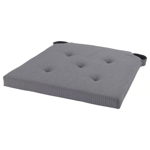 IKEA JUSTINA grey chair pad with tufted cotton fabric and foam filling on white background #10175004