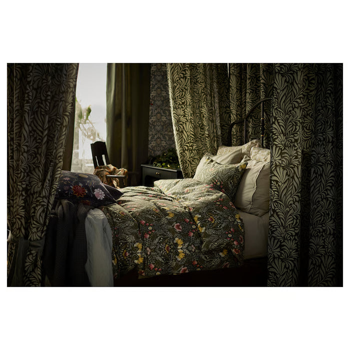 IKEA KÄRRDUNÖRT bedding styled on wooden bed frame in bedroom setting