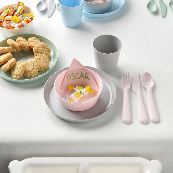 IKEA KALAS colourful kids tableware bowl cup and cutlery set on table with food and personalised napkin