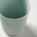 Close-up of IKEA KALAS light green textured grip kids mug showing ridged surface detail