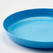 Close-up of IKEA KALAS mixed colour kids plates showing high-edge rim and stackable design detail