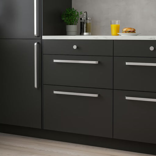 IKEA KALERUM handle installed on dark kitchen cabinets modern interior