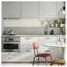 IKEA KALERUM stainless steel handles on grey kitchen cabinet doors with oven and red chair