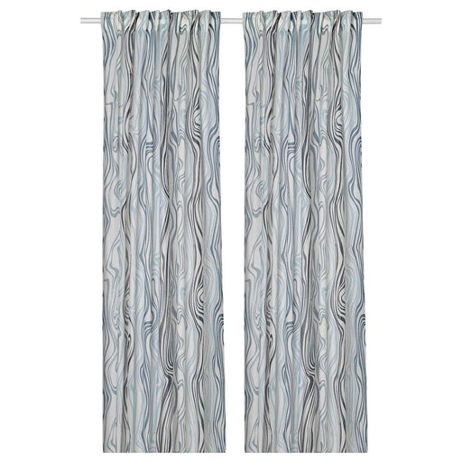 Digital Shoppy Elegant IKEA KLIPPNEJLIKA curtains in white and blue, adding style to a bedroom. 00568808