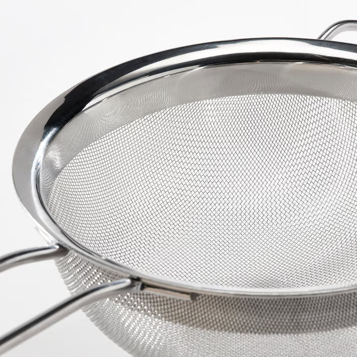 Close‑up of the IKEA KLOCKREN colander fine stainless steel mesh