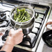 IKEA KLOCKREN colander in collapsed position, showing its space‑saving design for storage