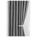  IKEA KNÖLFLY white tie-back holding grey curtains in living room