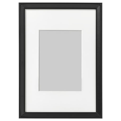 IKEA KNOPPÄNG black photo frame 21x30 cm with white mount on plain background #70387121
