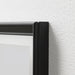 Close-up of IKEA KNOPPÄNG black frame mounted on white textured wall showing slim profile and edge detail