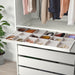 IKEA KOMPLEMENT light grey tray divider inside open PAX wardrobe drawer holding belts bracelets and jewellery
