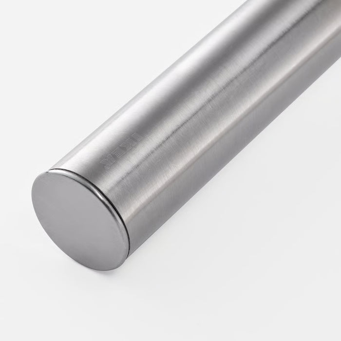 Close-up of IKEA KONCIS stainless steel potato masher showing masher head and handle detail