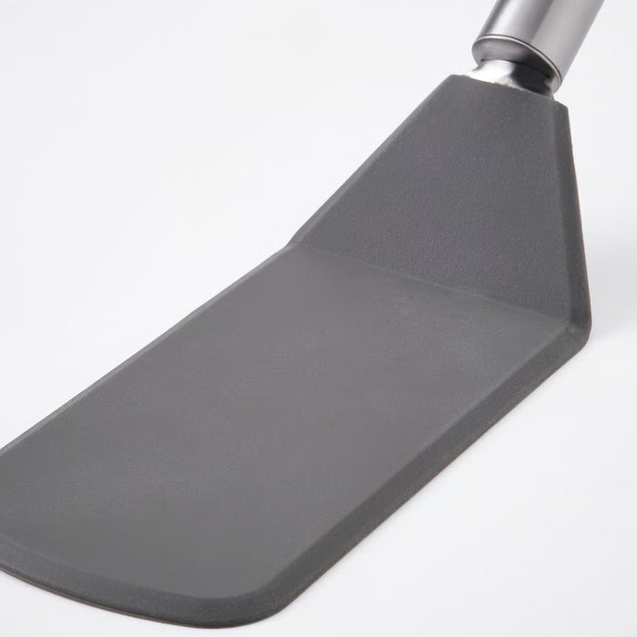 IKEA KONCIS dark grey turner shown from another angle on a kitchen surface