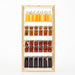  Multiple IKEA KORKEN jars in different sizes on a wooden shelf holding pickles, tomatoes and beets