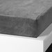 IKEA KRANSSALVIA grey fleece fitted sheet with elastic corners on white mattress