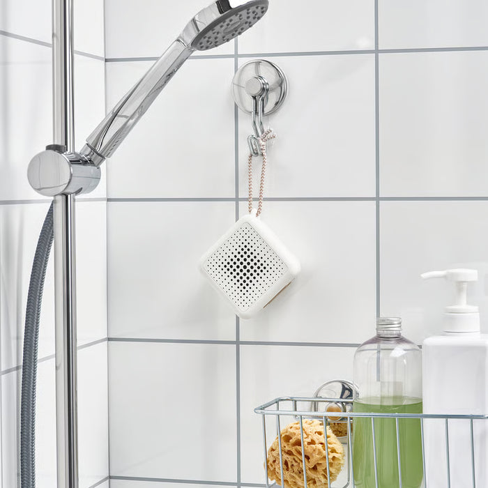  IKEA KROKFJORDEN suction cup hooks holding grey towels on white tiled bathroom wall