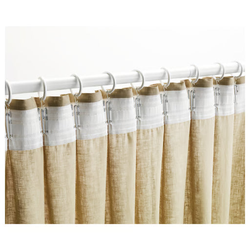 IKEA KRONILL white heading tape in use on curtain rod showing pleated folds and hanging loops