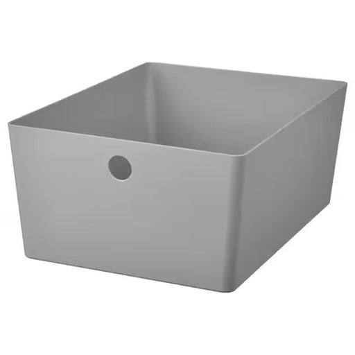 A rectangular wooden box with a light-colored finish and a lid that can be easily removed, providing a versatile storage solution for any room in the house.
