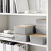Side view of IKEA KUGGIS light grey box with secure lid 90565301 50568622