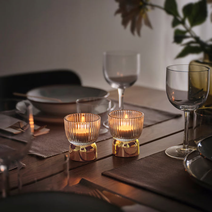 IKEA KUNGSTÄRNA clear glass and gold-colour tealight holder, alternate angle on plain background