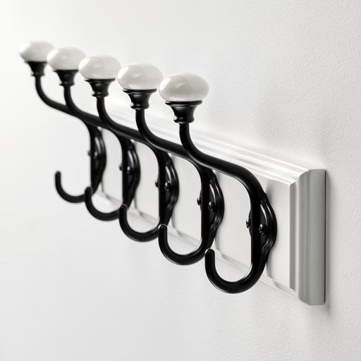 Close-up of IKEA LANDKRABBA white wall rack with five hooks-40531839