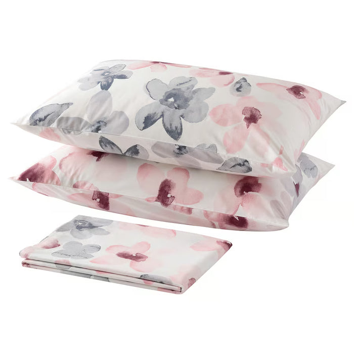 IKEA LAPPNYCKLAR flat sheet and pillowcases pink grey floral neatly arranged on bed #40588908