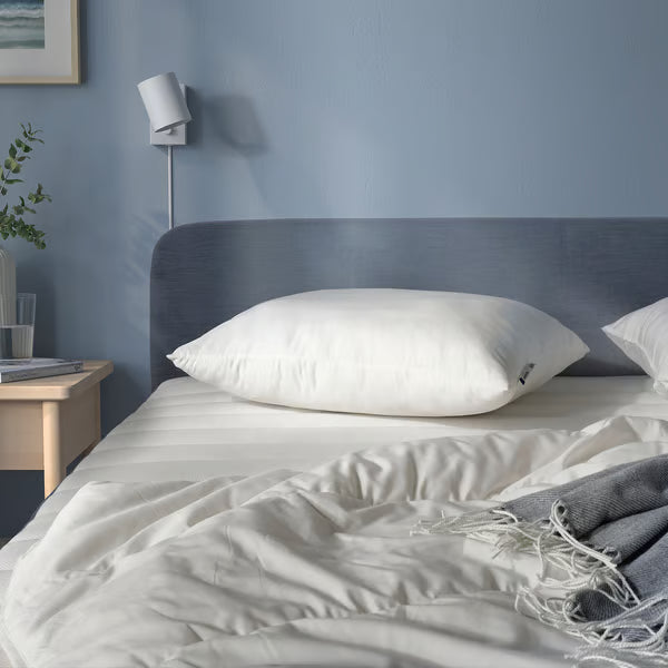 IKEA LAPPTÅTEL white bed pillow label visible laid flat clean background