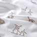 IKEA LEN cot duvet cover and pillowcase set product lifestyle shot in natural nursery light