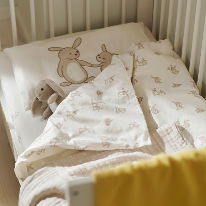 IKEA LEN cot duvet cover and pillowcase white beige close-up of sateen weave fabric texture