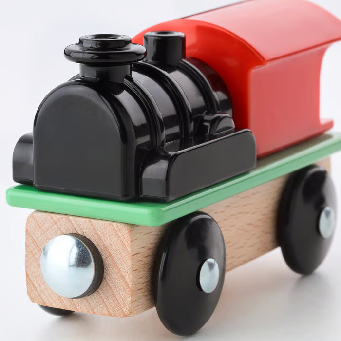 IKEA LILLABO wooden train set engine and cargo car detailed view showing solid wood construction