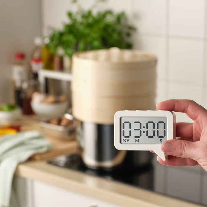 IKEA LJUNGPIPARE white clock timer angled view showing slim profile and depth