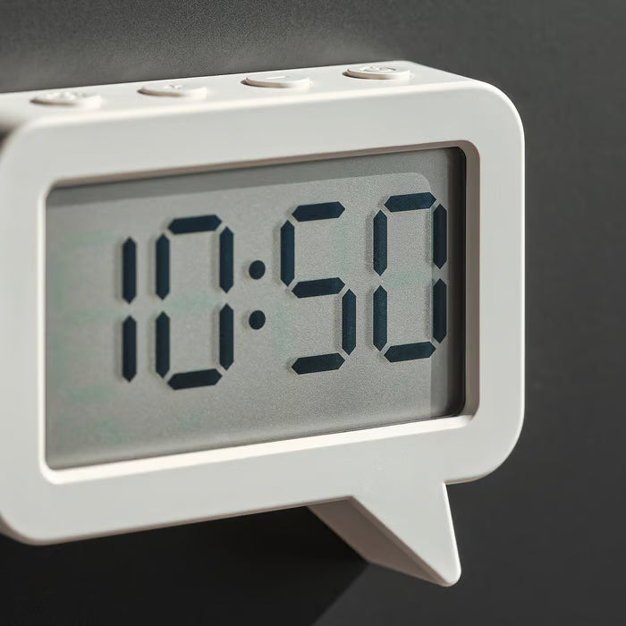IKEA LJUNGPIPARE white digital clock displaying time 18:50 in large easy-to-read digits