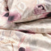 Close-up of IKEA LÖNNHÖSTMAL duvet cover showing a vibrant multicolor floral design-30547032
