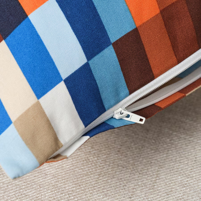  Close-up of IKEA LÖVNATURSKOG cushion cover brown blue cotton fabric texture and colour blocks