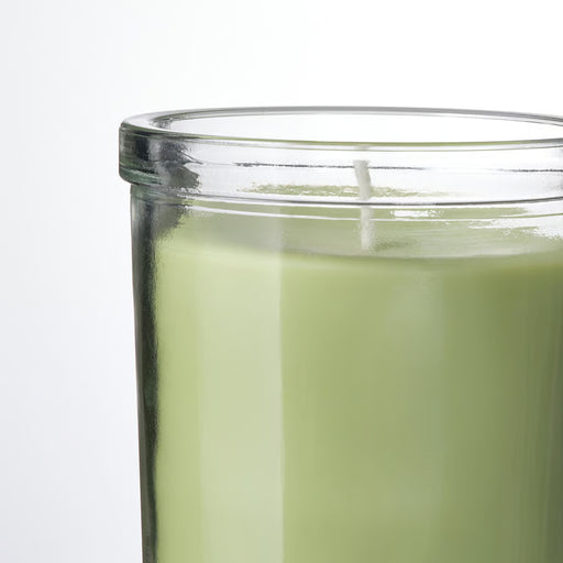 IKEA LÖVSKOGSLUND scented candle in clear glass jar with triple wick, light green hue